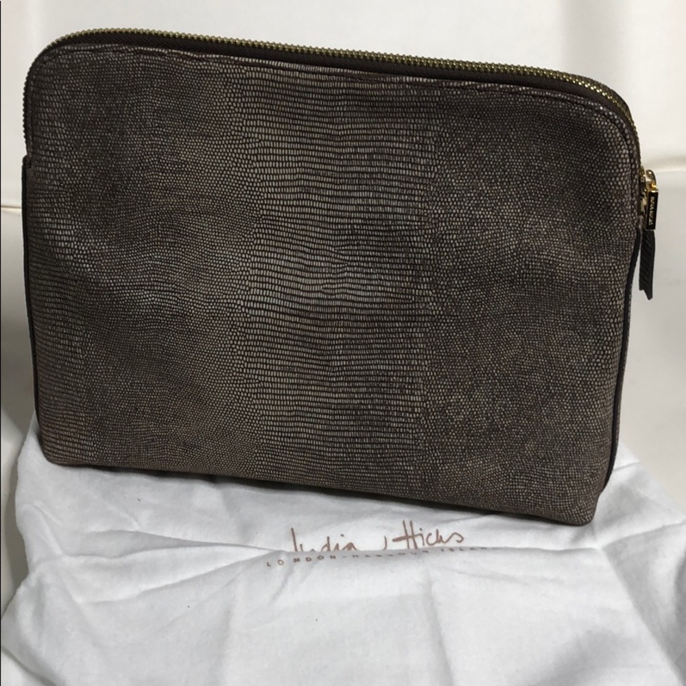 The “Insider” clutch by India Hicks NWOT